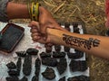Henna wooden stamps text Mahakal for decorating the body or clothes, India