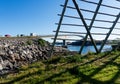 Henningsvaer bridge and wooden rack for drying cod, Lofoten arc