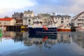 HENNINGSVAER, NORWAY, FEBRUARY 20, 2022: Henningsvaer harbor in Lofoten Archipelago, Europe. Royalty Free Stock Photo