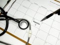 Hepatitis C word on schedule with pen and stethoscope. Royalty Free Stock Photo