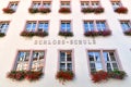 Heppenheim, Germany - September 2020: Facade of school called `Schloss Schule` in old historic building with window boxes