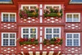 Heppenheim, Germany - Half timbered red and white windows with flower boxes of city hall building in Heppenheim
