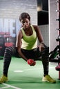 Her body means business. a young woman lifting weights at the gym. Royalty Free Stock Photo