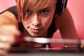 This is her passion. Closeup of a young female dj putting on a record. Royalty Free Stock Photo