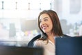 Her positivity brightens up the office. a young businesswomen working in the office. Royalty Free Stock Photo