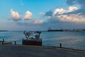 Heraklion Breakwater - The Mermaid Sculpture at Sunset Royalty Free Stock Photo