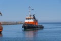 A Greek registered tugboat entering the Port of Heraklion in Crete