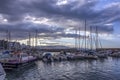 View to the old Venetian port in Heraklion city full of fishing boats and yachts Royalty Free Stock Photo