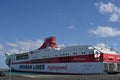 Big cruise ferry, Festos Palace, with red and white hull is flagship of Minoan Lines and is moored in port of Heraklion Royalty Free Stock Photo