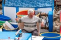 Heraklion, Greece - March 27, 2018: Fisherman does his work on a ship Royalty Free Stock Photo