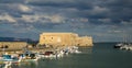 HERAKLION, GREECE - November, 2017: colorful fishing boats near old Venetian fortress Koule, Heraklion port, Crete Royalty Free Stock Photo