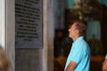 Heraklion, Greece, 25 September 2018, A person reads information in the cathedral of Agios Minas (Saint Minas Royalty Free Stock Photo