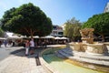 Heraklion, Greece, September 25 2018, Tourists at the Morosini fountain located in the center of Iraklio