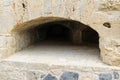 HERAKLION - November, 2017: Embrasure in the stone wall at old Venetian fortress Koule, Heraklion, Crete, Greece. Royalty Free Stock Photo