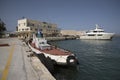 Heraklion Port, Crete, Greece. Coastguard vessel and private yacht in port