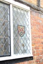 Heraldic shield coat of arms window