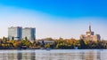 Casa Presei Libere seen over Herastrau lake in Herastrau Park, Bucharest. Royalty Free Stock Photo