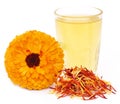 Herbal calendula flower with extract in a glass