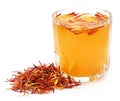Herbal calendula flower with extract in a glass