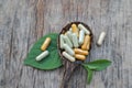 Herbal capsule medicien from green herb leaf for healthy eating