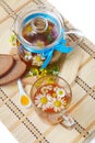 Herbal floral tea with camomile flowers and honey Royalty Free Stock Photo