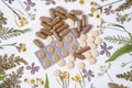 Herbal medicine in capsules for healthy eating concept with organic herb Royalty Free Stock Photo