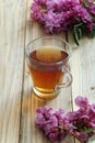 Herbal natural tea with fresh acacia flowers