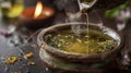 A herbal oil blend bubbling over a low flame used in Ayurvedic oil enemas for promoting deep internal detoxification