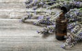 Herbal oil bunch lavender flower rustic wooden background