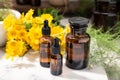 Herbal oil, essential oil, perfume on amber glass bottles