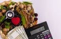 Herbal pills, calculator, stethoscope, money, red heart, composition of spices with green leaves on white background. Medical