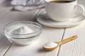Herbal sweetener stevia in spoon and a cup of coffee Royalty Free Stock Photo