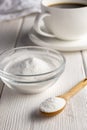 Herbal sweetener stevia in spoon and a cup of coffee Royalty Free Stock Photo