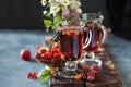 Herbal tea with berries, autumn healthy concept.