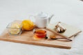 Herbal tea with chamomile flowers, turmeric and honey on a wooden board. Treatment of hot drink ginger. folk remedies Royalty Free Stock Photo