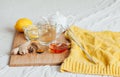 Herbal tea with chamomile flowers, turmeric and honey on a wooden board. Treatment of hot drink ginger. folk remedies Royalty Free Stock Photo