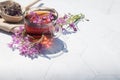 Herbal tea from fermented kipreya leaves in a glass Cup on a light background