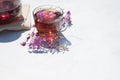 Herbal tea from fermented kipreya leaves in a glass Cup on a light background