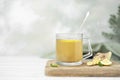 herbal tea with grated ginger, lemon and mint in a glass mug Royalty Free Stock Photo
