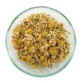 Herbal tea, heap of camomile flowers. Royalty Free Stock Photo