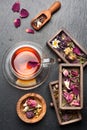 Herbal tea with honey and dried herbs and flowers. top view Royalty Free Stock Photo