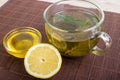 Herbal tea with honey and lemonon the wooden background Royalty Free Stock Photo