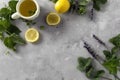 Herbal Tea with Lemon, Herbs, and Lavender on Stone Background. Royalty Free Stock Photo