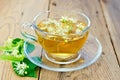 Herbal tea of linden flowers in glass cup on board Royalty Free Stock Photo