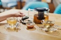 Herbal tea and linden honey in glass dishes