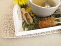 Herbal tea with marigold and cornflower with tea infuser Royalty Free Stock Photo