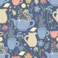 Herbal tea seamless pattern with lemons, tea pots, wild flowers and mugs of tea on blue Royalty Free Stock Photo