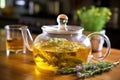 herbal tea steeping in a glass teapot