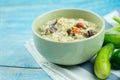 Herbed soya beans with minced pork in coconut milk served in white bowl Royalty Free Stock Photo