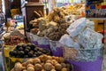 Herbs spices dried lemons menthol crystals blue dye at the old market in Dubai United Arab Emirates